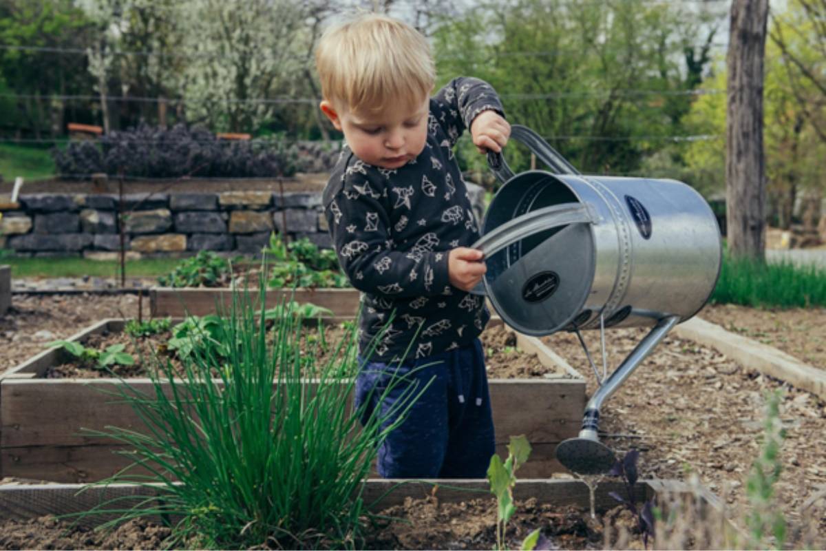 boy-watering-plants