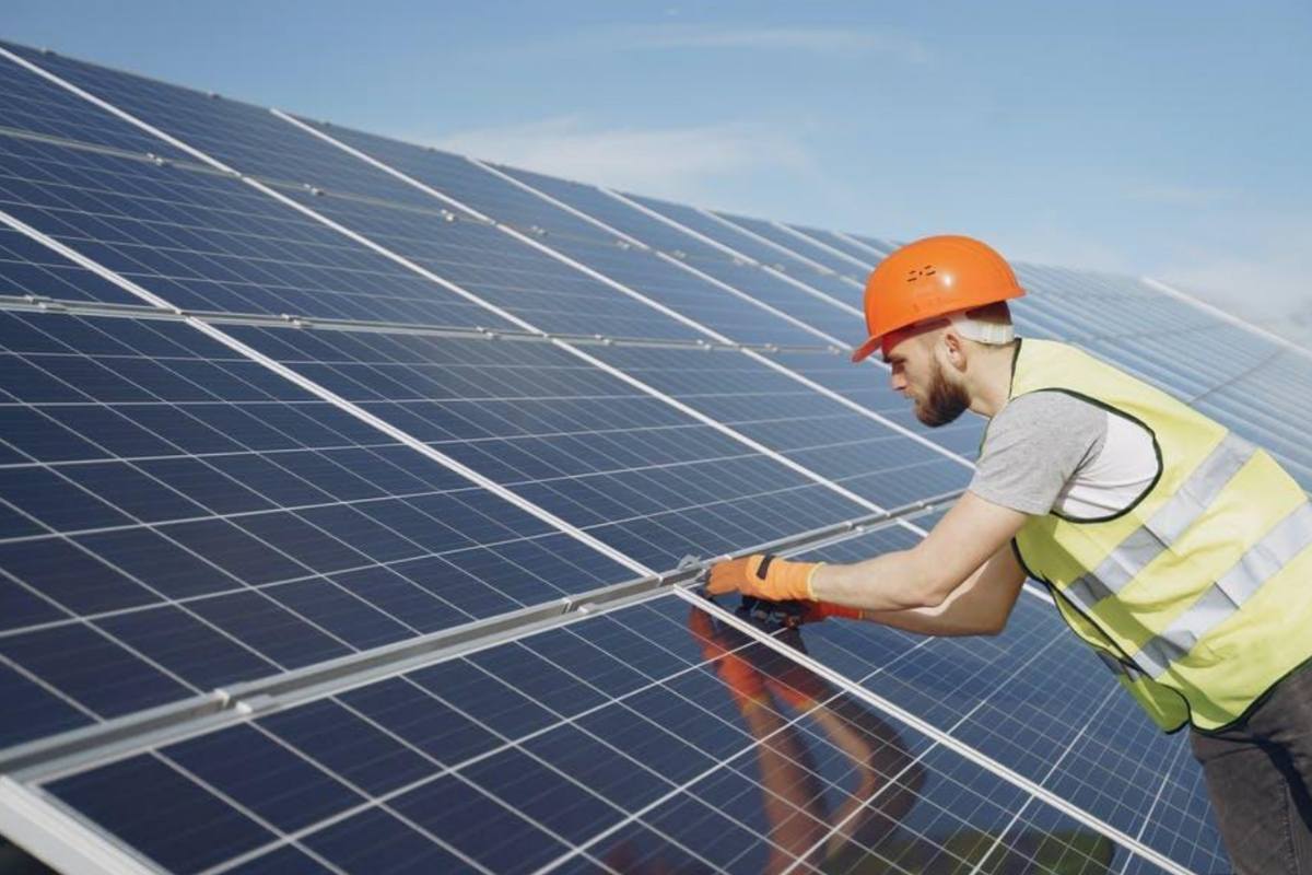 person-installing-solar-panels