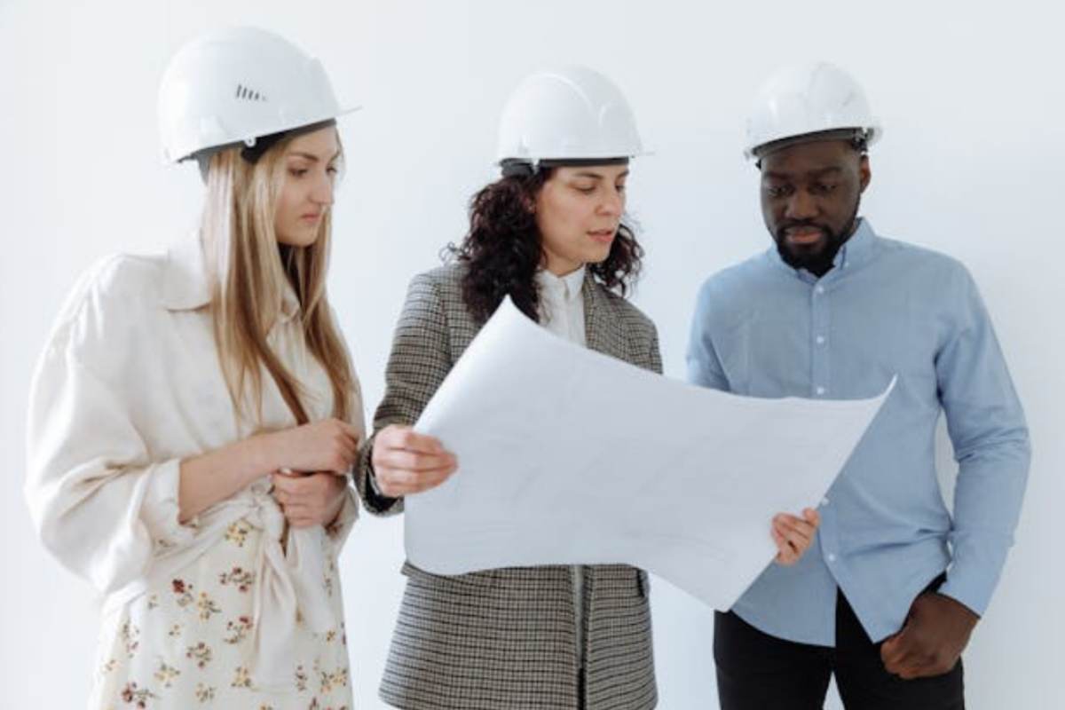 three-people-with-helmets
